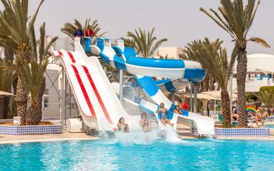 Guests on the water slides at El Mouradi Djerba Menzel Guests on the water slides at El Mouradi Djerba Menzel