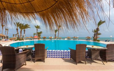Pool bar seating with sea view at El Mouradi Djerba Menzel Pool bar seating with sea view at El Mouradi Djerba Menzel