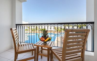 Room balcony with pool view at El Mouradi Gammarth