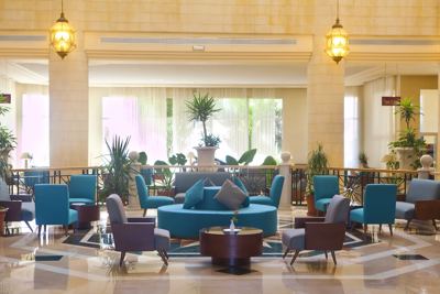 Hotel lobby lounge with seating at El Mouradi Hammamet Hotel lobby lounge with seating at El Mouradi Hammamet