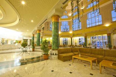 Hotel lobby lounge with marble columns at El Mouradi El Menzah Hotel lobby lounge with marble columns at El Mouradi El Menzah