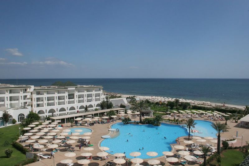 Hotel, swimming pools and beach seen from above at El Mouradi Palm Marina, Port El Kantaoui Hotel, swimming pools and beach seen from above at El Mouradi Palm Marina, Port El Kantaoui