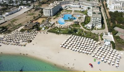 Aerial view of the beach and gardens at El Mouradi Palm Marina Aerial view of the beach and gardens at El Mouradi Palm Marina