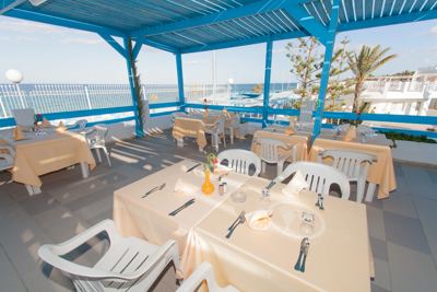 Covered restaurant terrace by the sea at El Mouradi Club Selima Covered restaurant terrace by the sea at El Mouradi Club Selima